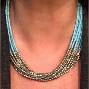 Sasspurilla 3 piece seed bead necklace, hoop earrings and flexible cuff